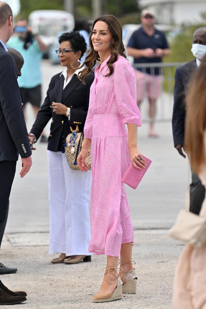 **March**
<br><br>
Looking effortlessly chic in this pink Rixo dress, Catherine kept it understated in her favourite Castaner wedge espadrilles.