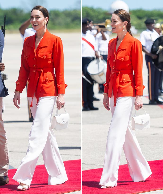**March**
<br><br>
Catherine actually bought this vintage Yves Saint Laurent blazer during her university years but donned it again during her royal tour through the Caribbean. We adore how she styled it with wide-leg trousers and a Mulberry mini bag.