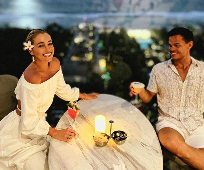 The lovebirds celebrated a year since the finale night of the *Bachelor* when they could finally become official at The Apurva Kempinski in Bali. 
<br><br>
Holly posted a picture from their date with a frangipane in her hair and cocktails in their hands.  
<br><br>
She proudly captioned the milestone snap, "An unforgettable evening celebrating 1 whirlwind year since I trembled down that bridge on finale night. 🌹 No pressure for the 10 year anniversary @jimmynicholson the bar is set pretty high 🐠."
 <br><br>
In her comments, Jimmy joked about their ten year anniversary plans by writing, "Im thinking for our 10 year we do a garage tour followed by some DIY.. thoughts?"