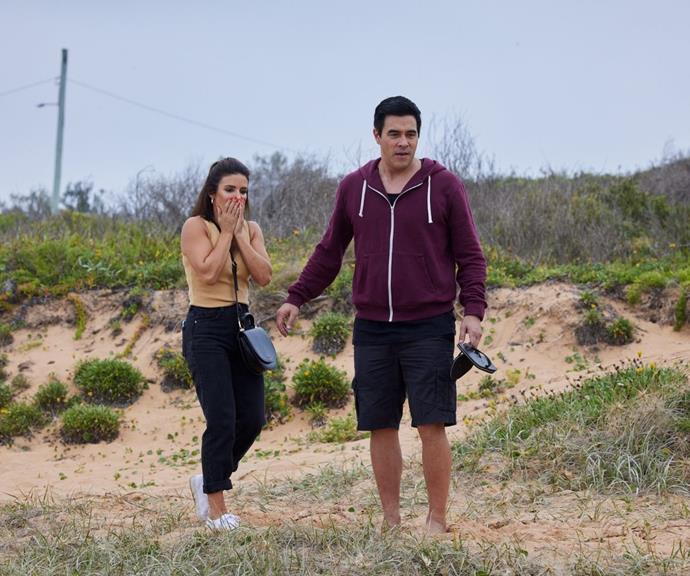 The peaceful sand of Summer Bay is turned into a crime scene when Leah and Justin discover the body of PK on the beach.