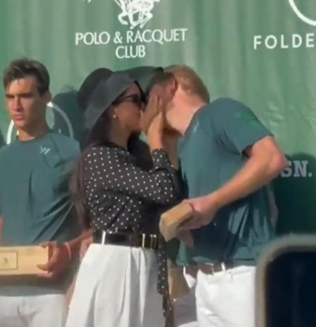 Meghan laid a kiss on her polo playing prince in May 2022 to the delight of fans.