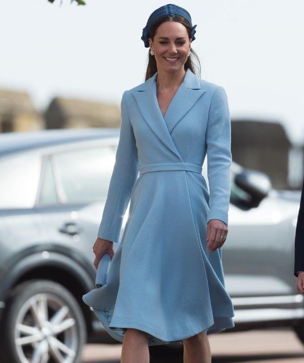 The Duchess of Cambridge was glowing in this Emilia Wickstead pastel blue coat midi dress with a waist-sinching belt, open collar and long sleeves during the traditional Easter Sunday Church service at St George's Chapel in April 2022.
