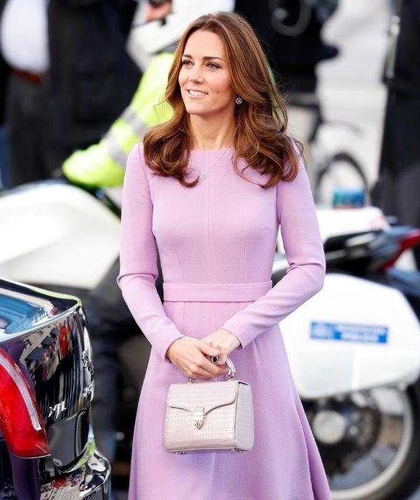 Never failing to stun in lilac, Catherine, Duchess of Cambridge, wore a fan-favourite Emilia Wickstead number for the Global Ministerial Mental Health Summit in October 2018. Debuting the frock during a visit to Hamburg, Germany, [the recycling duchess](https://www.nowtolove.com.au/fashion/fashion-trends/kate-middleton-recycled-outfits-62373|target="_blank") re-donned the long-sleeved flared number for the occasion.