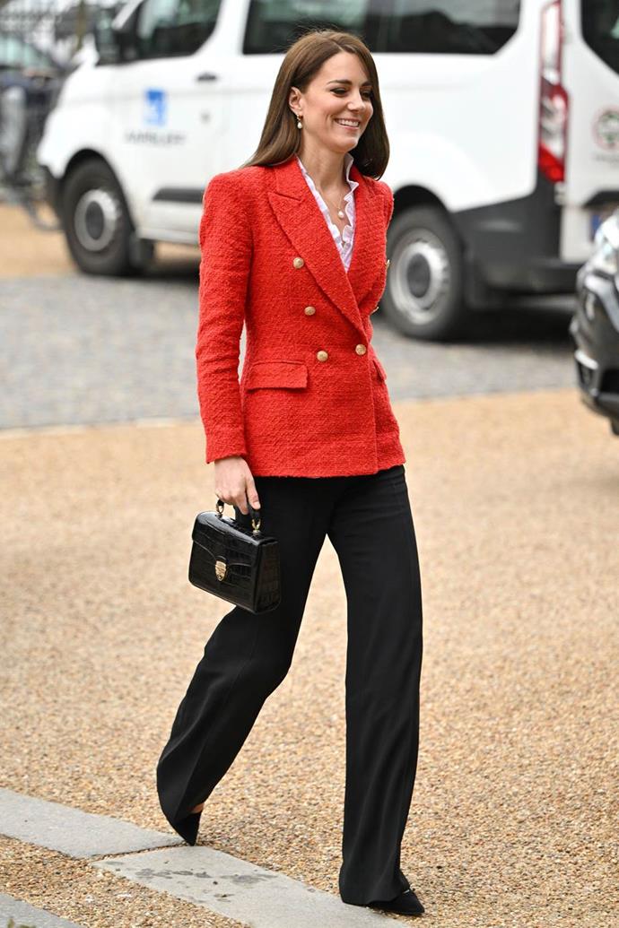She's certainly partial to a wide-leg number. Pairing these black trousers with a red coat from Zara, Gianvito Rossi pumps and a leather Aspinol of London bag, the duchess was a vision during a visit to the University of Copenhagen in February 2022.