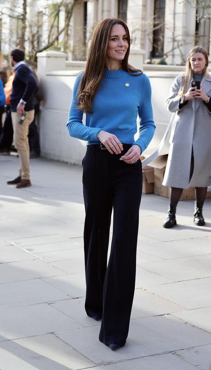 Catherine never fails to stun in Alexander McQueen. In early 2022, the duchess paired this vibrant cashmere jumper with Jigsaw wide-leg trousers for an outing to support relief efforts for Ukraine.