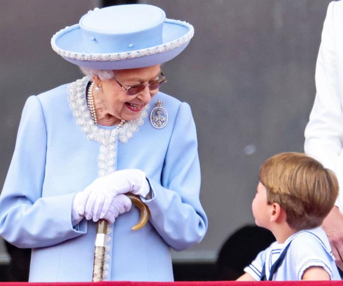 The Queen and Prince Louis exchange some words during Trooping the Colour.