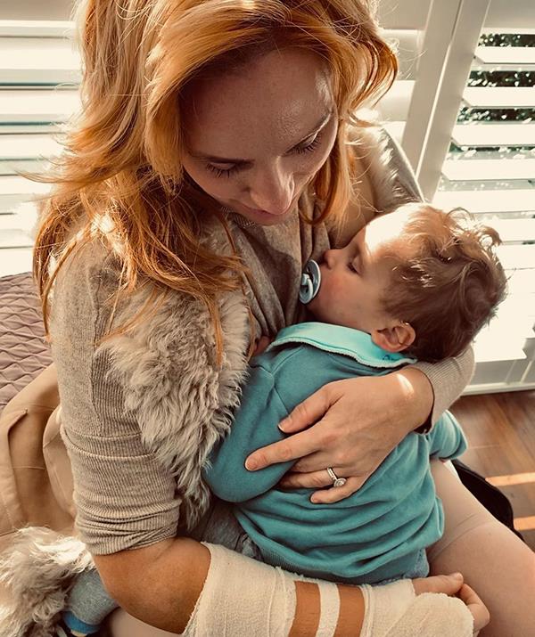 In June 2022, little Ollie contracted bronchitis - but the silver lining was extra hugs for mum! "I'm loving how much Ollie loves cuddles and extra love," Jules captioned this tender pic.