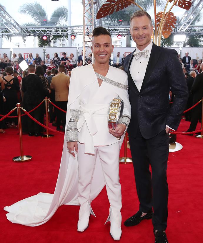Singer Anthony Callea looked avant-garde chic in this suit ensemble as he posed with husband Tim Campbell.