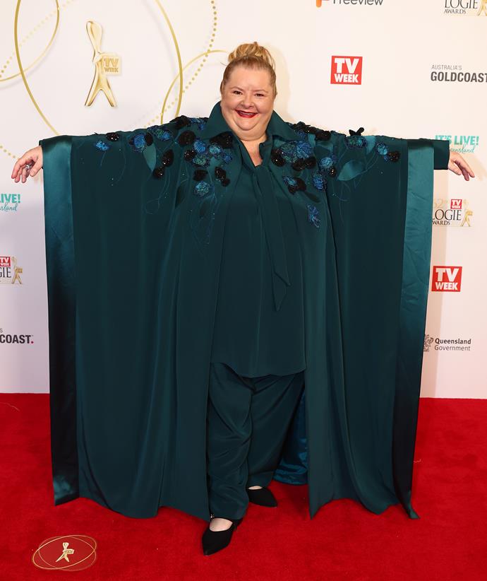 Magda Szubanski was all smiles as she posed for photos on the red carpet.
