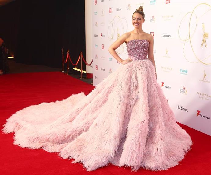 *Neighbours* star April Rose Pengilly looked like she was fresh out of a fairytale in this Alin Le' Kal feathered ball gown.
