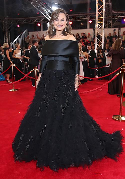 *The Project*'s Lisa Wilkinson opted for a Velani feathered gown which featured a satin bodice, belt detailing and off-the-shoulder sleeves.