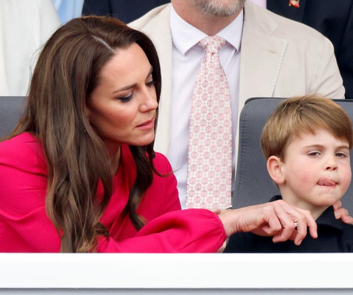 Kate was photographed trying to entertain her son at the Platinum Pageant.