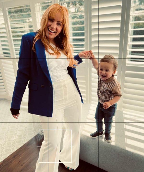 Jules loves posing with her son! "Feeling cute with my cub," she wrote.