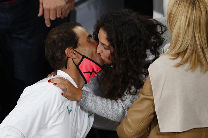 Stealing a smooch in the stands in 2020.