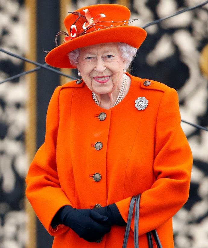 The Queen loves colour and orange looks so delightful on her! She wore his coordinated outfit at her Baton Relay in 2022.