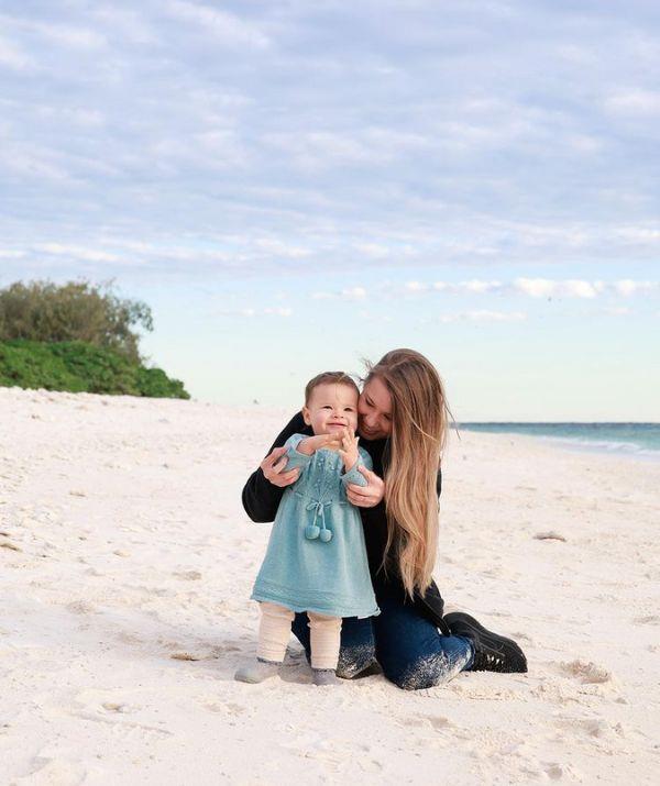 The beach-loving mum and daughter duo braced the sand in winter where they captured this adorable shot. Bindi was clad in jeans and jumper while Grace looked cosy and cute in white pants and a long blue shirt.
<br><br>
"These smiles and hugs make my life. 💙," Bindi penned.