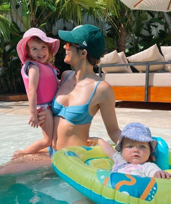 "I guess this makes Lola a water-melon 🍉," Laura joked in July 2022 during a family pool day.