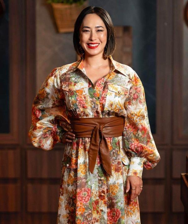 This statement belt from Husk really completed Melissa's *MasterChef* look during the 2022 season. Paired with a floral print dress from Alémais, we can't get enough of the fit.