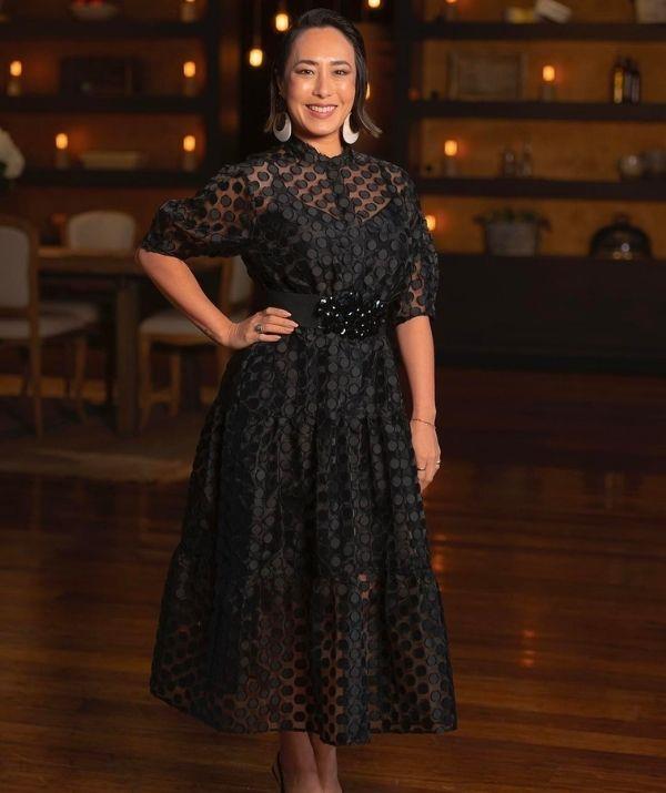 The food writer looked as elegant as ever in this black, mid length, sheer dress from Ted Baker. With white Lovisa earrings and Zara heels, we won't forget this one.