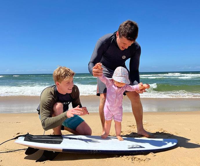 While on a family holiday in April 2022, Robert and Chandler tried to teach little Grace to surf! "She's gonna be shredding it in the surf in no time 😂" Robert captioned this post.