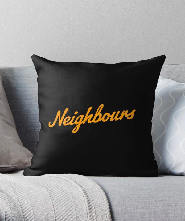 **[Retro *Neighbours* throw pillow, Redbubble, $29.61](https://www.redbubble.com/i/throw-pillow/Retro-Neighbours-by-luntungansa/71133632.5X2YF?country_code=AU|target="_blank")**
<br><br>
*Neighbours* might be over, but your binge-watching days are not. Elevate your lounging around days with this comfy Ramsay St-inspired cushion.
<br><br>