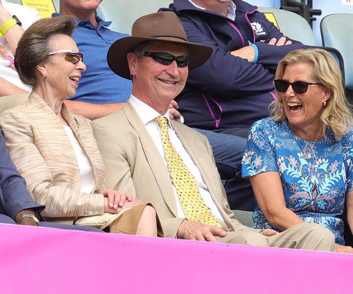 She was photographed sharing a laugh with sister-in-law Princess Anne and her husband Sir Timothy Laurence, who wore matching tan outfits.