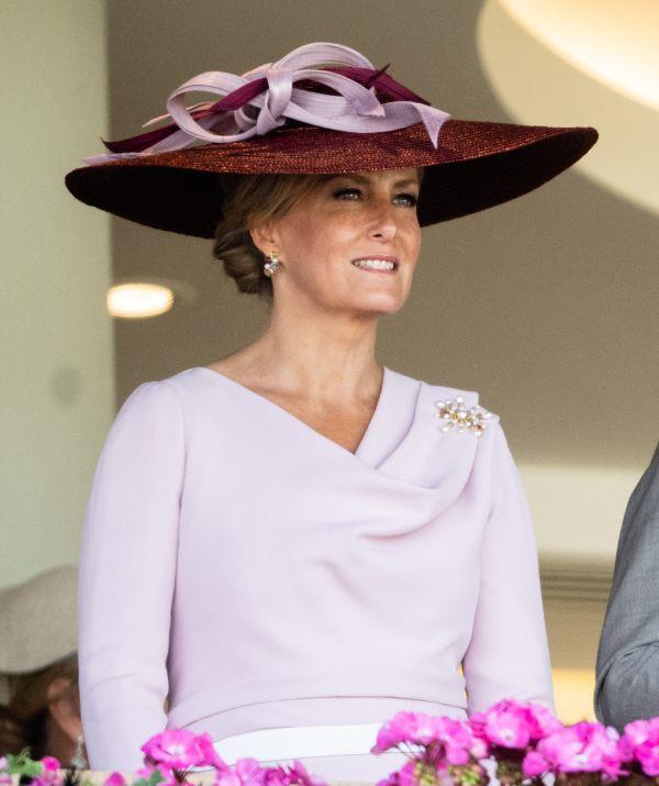 The countess absolutely glistened in this pink Grecian dress by Suzannah and a wide brimmed maroon fascinator as she attended the 2022 Royal Ascot.