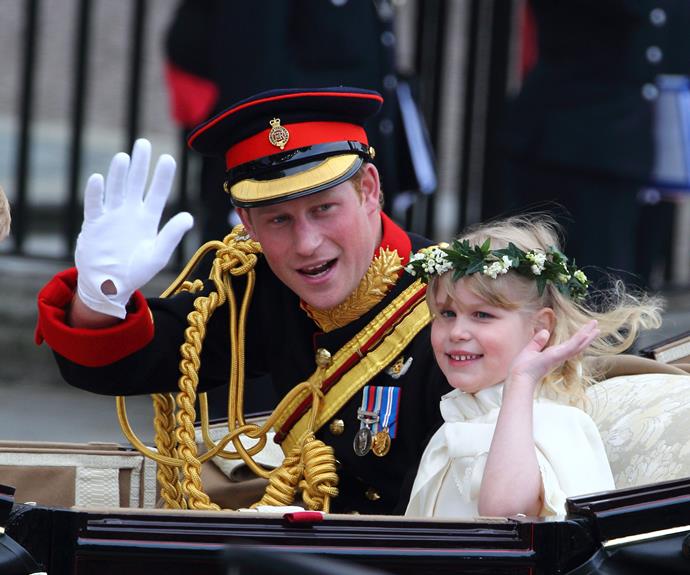 She rode in a carriage with cousin Prince Harry, confidently waving to the crowds as they passed.