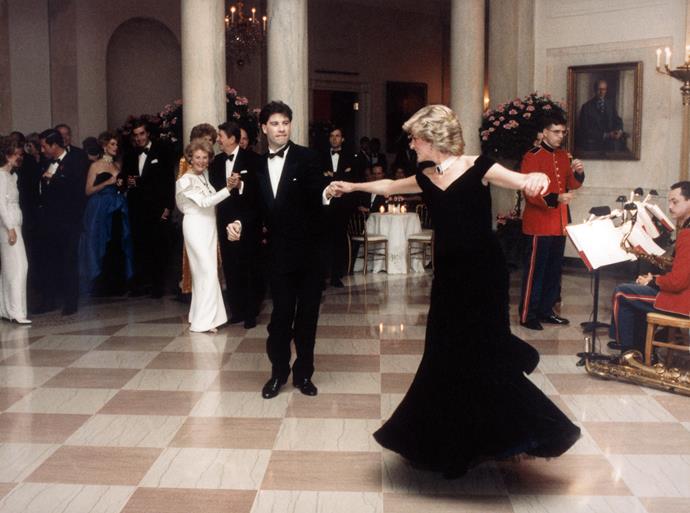 Dancing with John Travolta at The White House, Diana was a vision in a black off-the-shoulder dress designed by Victor Edelstein.