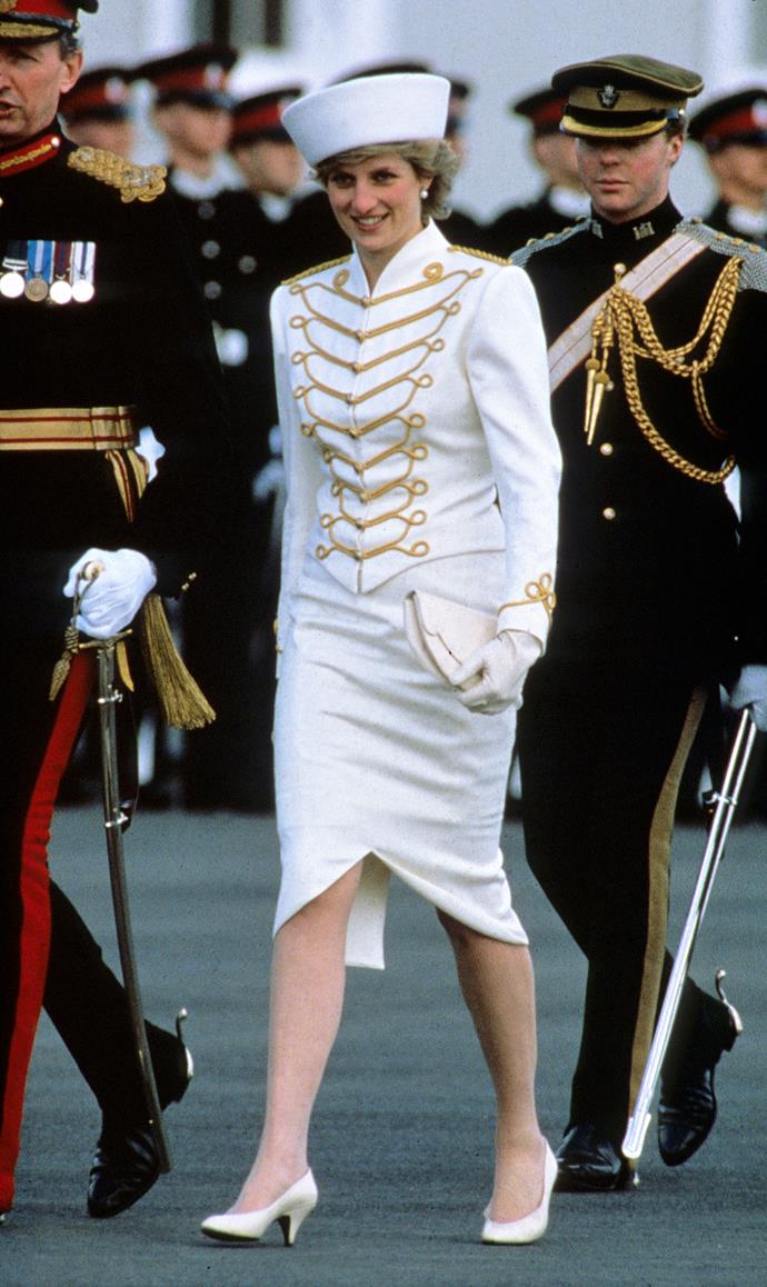 Catherine Walker's designs were chosen yet again for a visit to the Sandhurst Military Academy on April 10, 1987. In keeping with the location for the day, Diana's white ensemble featured military-esque piping along the front of the jacket.