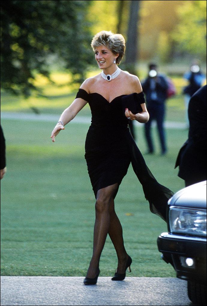 In one of her most iconic looks, Diana chose a figure-hugging black silk dress by Greek designer Christina Stambolian for a *Vanity Fair* bash at the Serpentine Gallery on November 20, 1994.