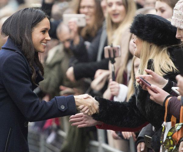 Adorably, she made a point of introducing herself to waiting crowds, saying: “Hi, I’m Meghan!”