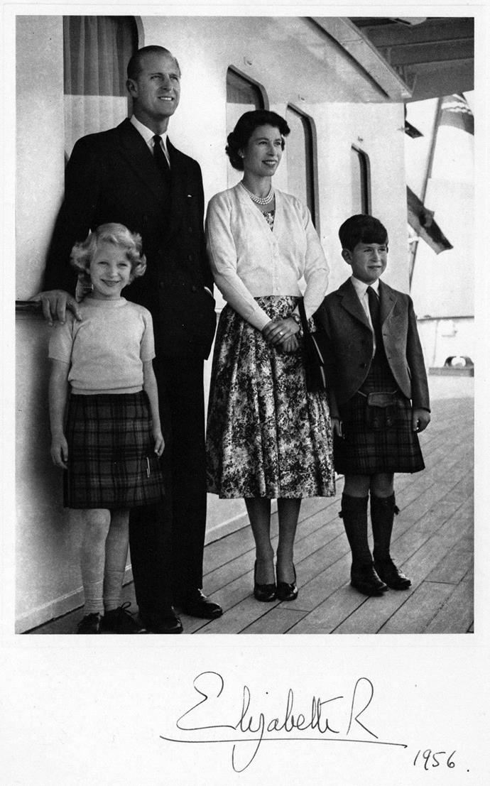 The Queen, along with Prince Philip and their Children Princess Anne and Prince Charles, posed for their 1956 Christmas card aboard the royal yacht Britannia.