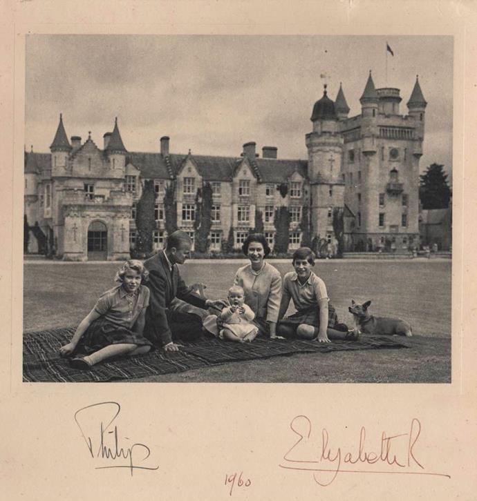 The Queen and Prince Philip sent this card out in 1960, posing on a rug on the lawns of Balmoral Castle with their children Princess Anne, Prince Charles and a bonny wee baby Prince Andrew. With obligatory corgis in tow, of course.