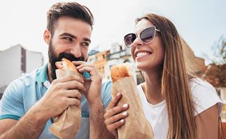 Couple eating baguettes