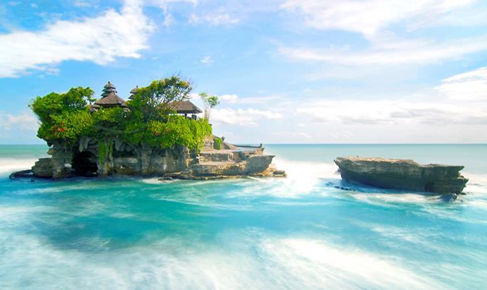 Ancient Tanah Lot sea temple is popular with tourists interested in Bali's spirituality.