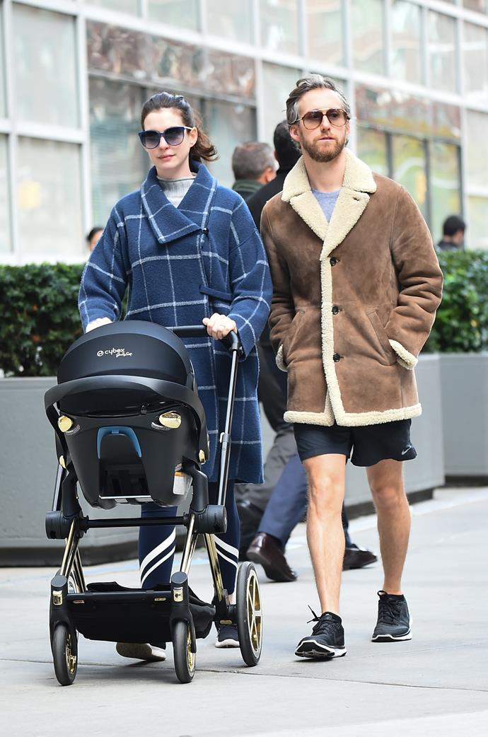 Anne Hathaway out and about with her son Jonathan and husband Adam Shulman. *(Image: Getty)*