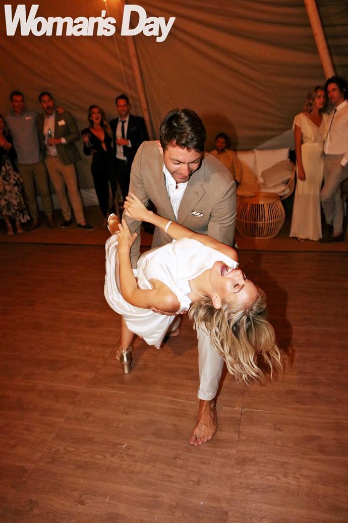The newlyweds share their first dance to Neil Young's *Harvest Moon*.