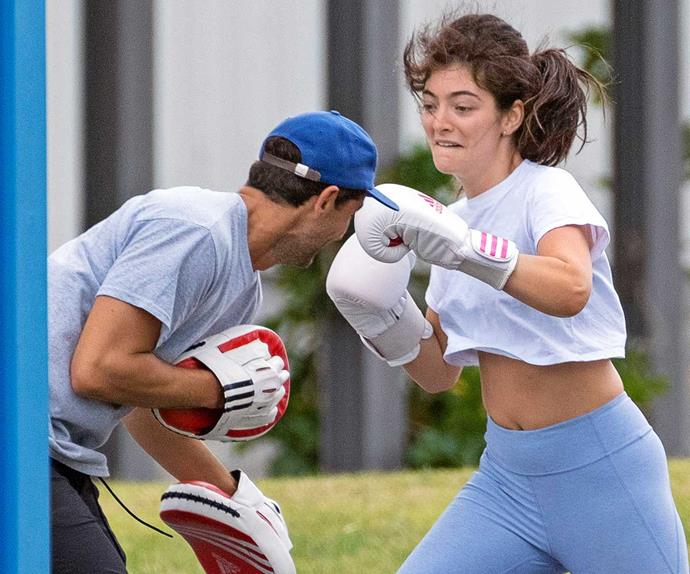 Lorde shows her personal trainer who's boss during an intense boxing bootcamp workout