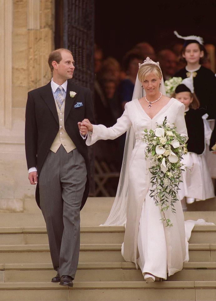 **The Countess of Wessex, 19 June 1999**
<br><br>
The Queen's youngest son, Prince Edward married Sophie Rhys Jones at St George's Chapel on June 19, 1999.
<br><br>
The Countess of Wessex wore a hand-dyed silk organza and silk crepe gown designed by Samantha Shaw.
<br><br>
Full length with long sleeves, it featured pearl and crystal beading details and she accessorised with a black and white pearl necklace with matching earrings designed by Prince Edward and wore a diamond tiara, lent to her by the Queen.