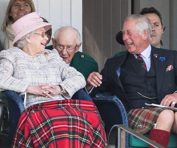 This image of the Queen having a rolicking good time with her son Prince Charles was taken during the Braemar Gathering in Braemar, Scotland in 2006.