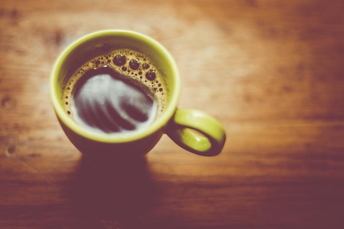 While a cup of black coffee won't break you out of your fast, if you're adding milk and sugar to the mix, you may be putting yourself on the back foot. *(Image: Getty)*