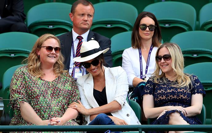 Meghan looked like she was having a grand old time with two of her closest pals Genevieve (L) and Lyndsay (R). *(Image: Getty)*