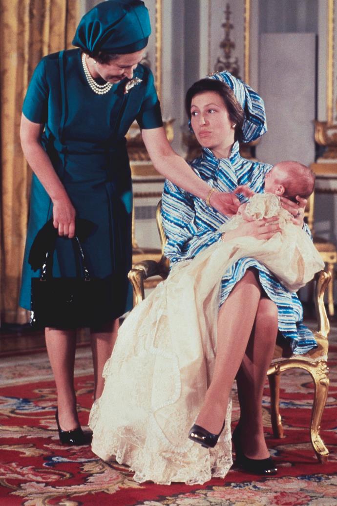 **Peter Phillips, 1977**
<br><br>
The Queen's first grandchild was Peter Phillips, the first child of Anne, Princess Royal. Like his younger cousin Prince William, Peter was baptised in the Music Room at Buckingham Palace on December 22nd, 1977. 
<br><br>
According to reports, Anne and her husband at the time Mark Phillips, declined the Queen's offer to give Peter (and then his younger sister Zara) royal titles, becoming the first legitimate grandchild to a monarch without a title or courtesy title in more than 500 years.
<br><br>
*(Image: Getty)* 