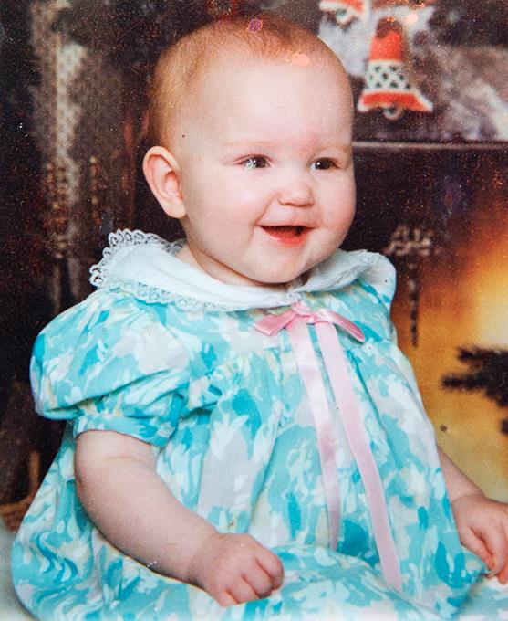 Hanna, seen here at seven moths old, was diagnosed with CF at eight weeks old.