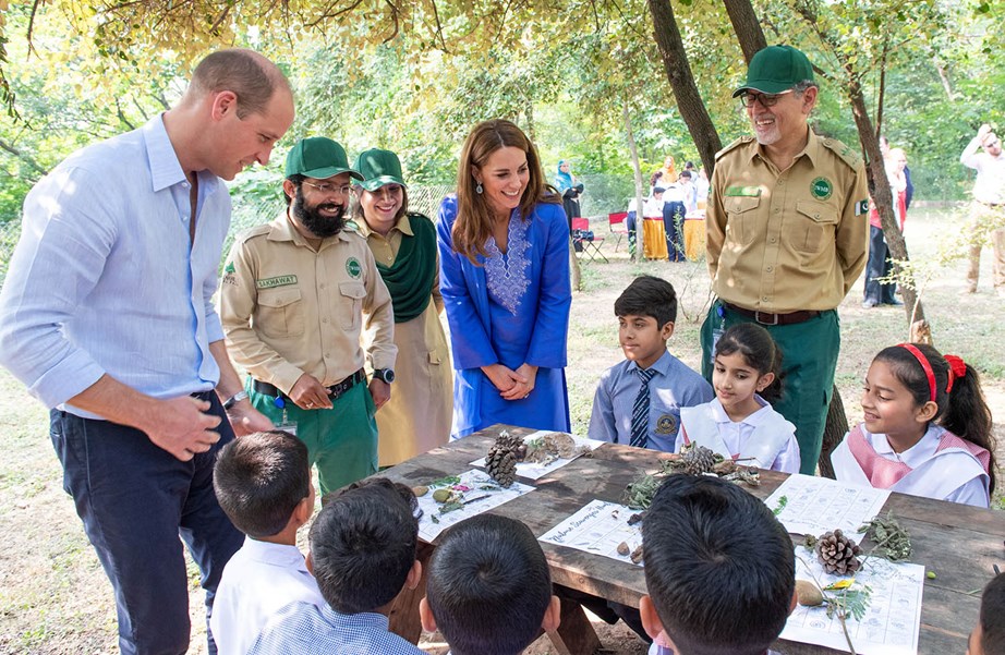 William and Kate joined local school children yesterday to see the programme run by the national park to help educate children on the environment and conservation. *(Image: Getty)*
