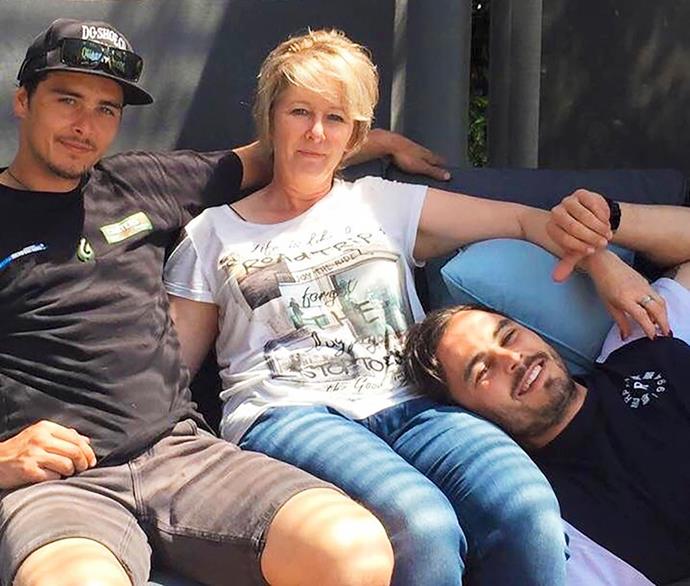 Zac and brother Victor with their mum in 2017.