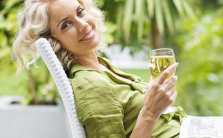 Woman relaxing drinking wine