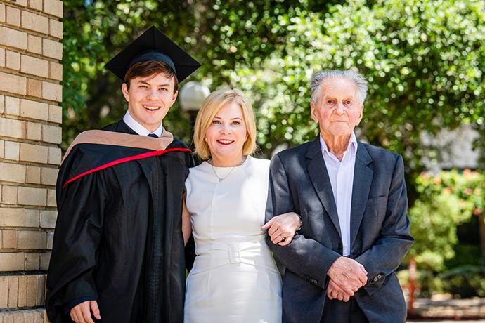 Jamie at his graduation with proud mum Paula and grandpa John