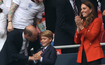 Sporting royalty! New photos revealed of Prince George playing football with his school team